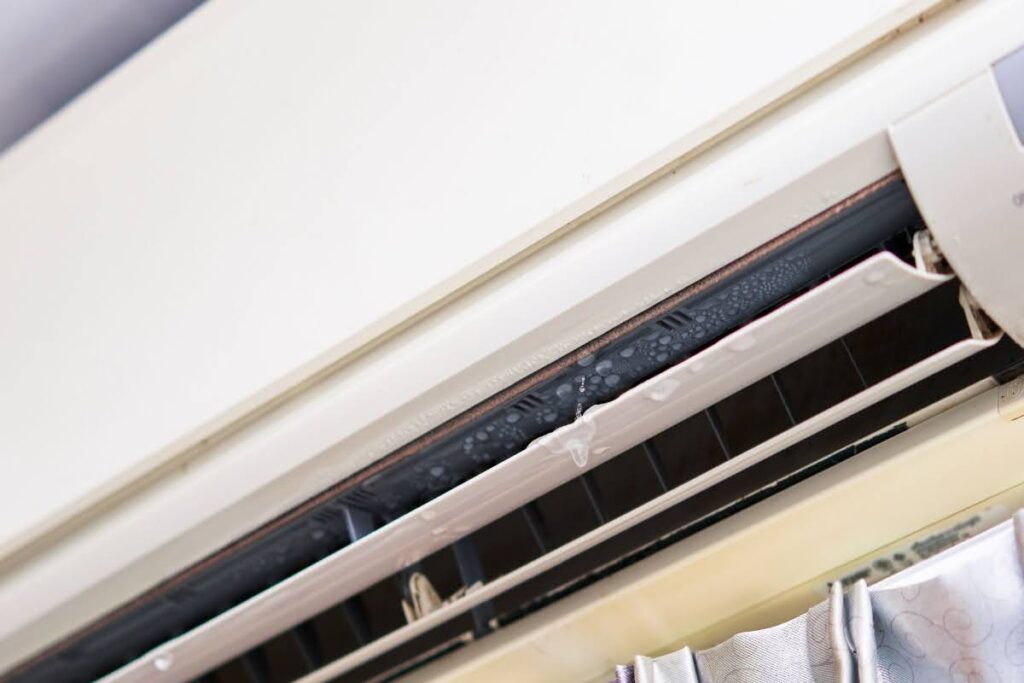 an indoor AC unit dripping water