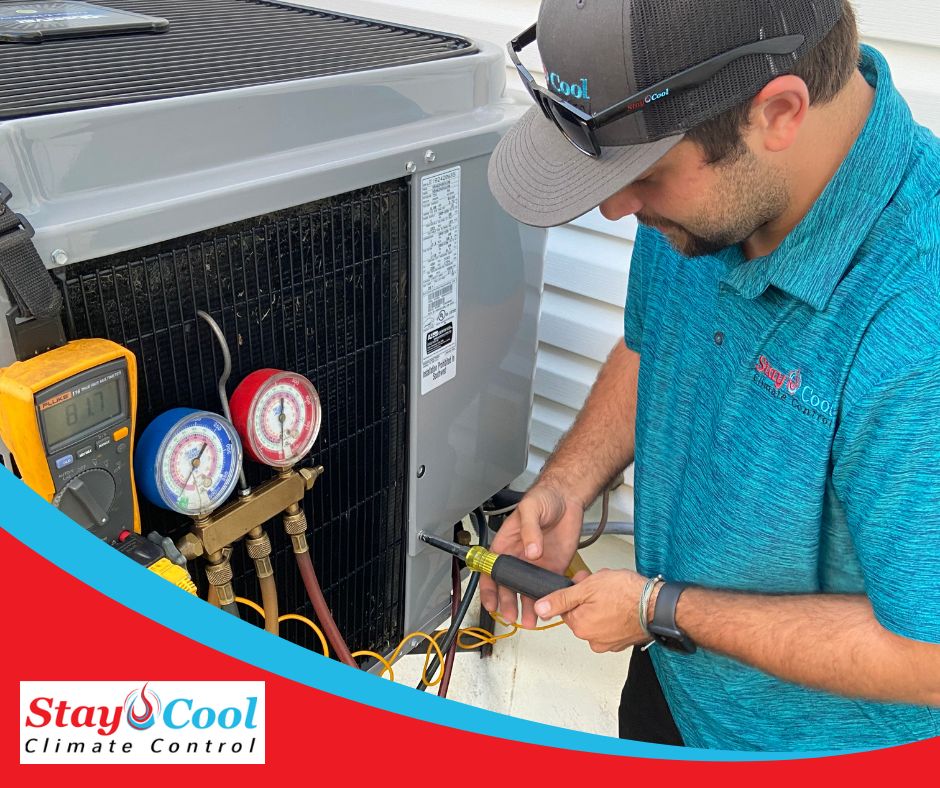 HVAC technician performing AC maintenance